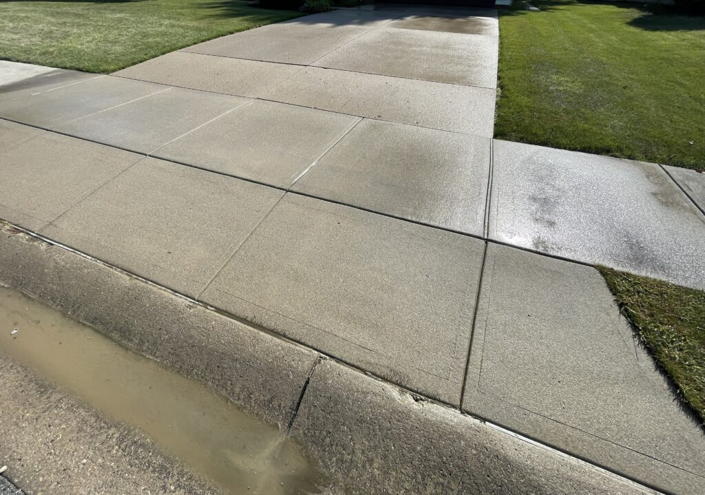 Freshly sealed concrete driveway in Lima, Ohio